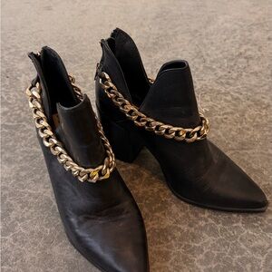 Steve Madden Black Leather Pointed Ankle Boots with Gold Chain Detail